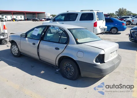 1999 Saturn Sl z USA, uszkodzony, nr VIN 1G8ZF5289XZ374760